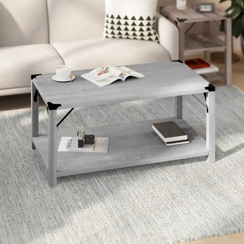 Table basse à 2 niveaux avec entretoises latérales et coins renforcés en métal