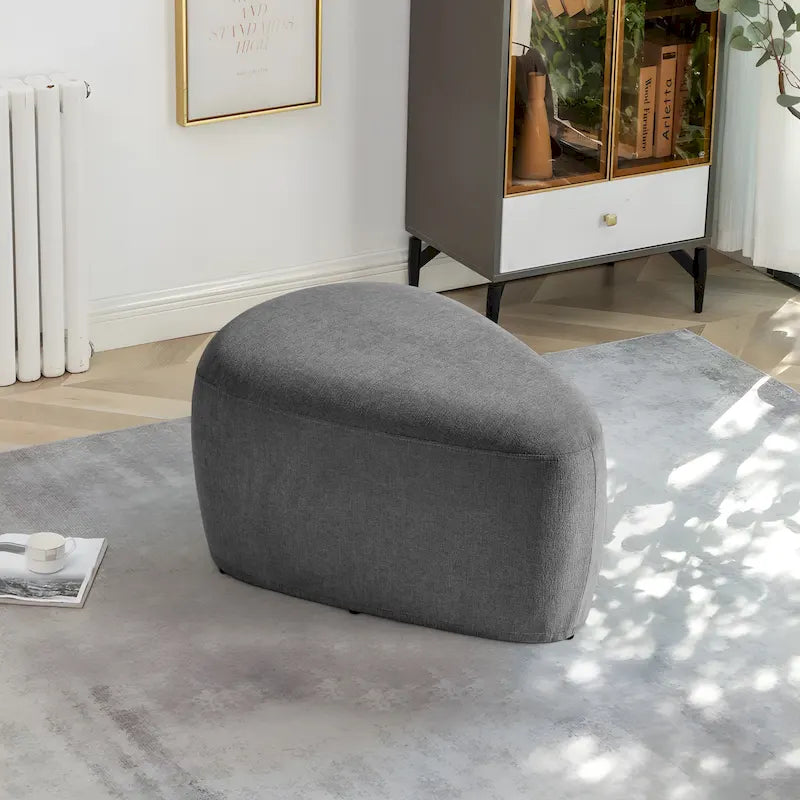 Pouf d'appoint triangulaire capitonné moderne