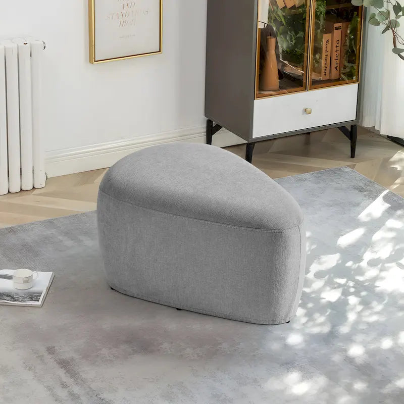 Pouf d'appoint triangulaire capitonné moderne