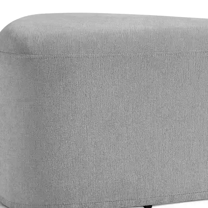 Pouf d'appoint triangulaire capitonné moderne