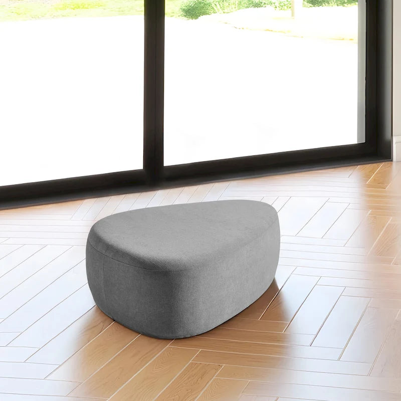 Pouf d'appoint triangulaire capitonné moderne