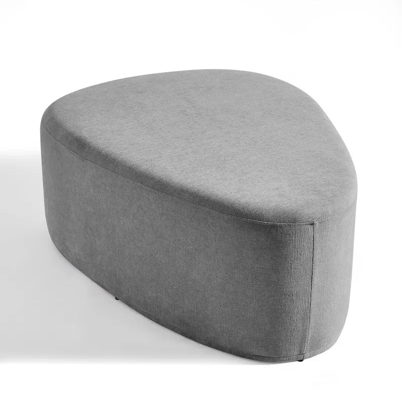 Pouf d'appoint triangulaire capitonné moderne