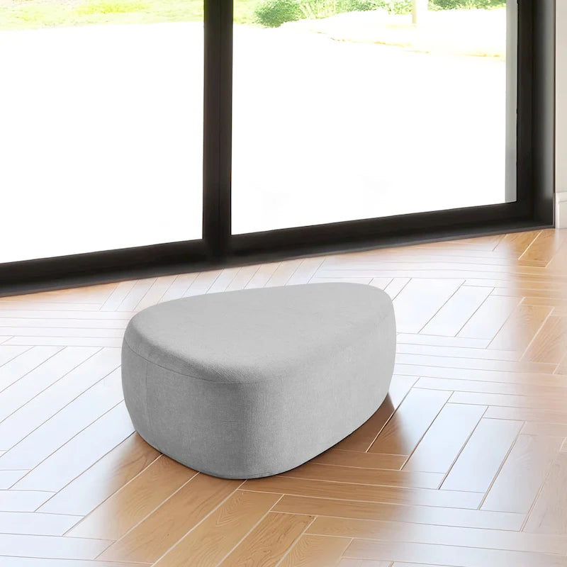 Pouf d'appoint triangulaire capitonné moderne