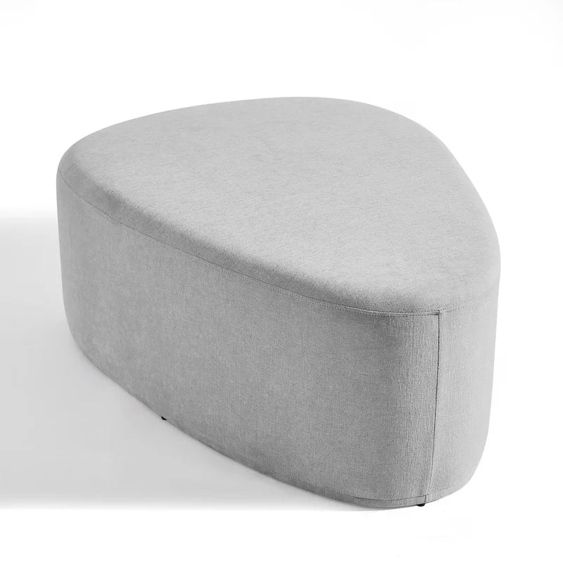 Pouf d'appoint triangulaire capitonné moderne