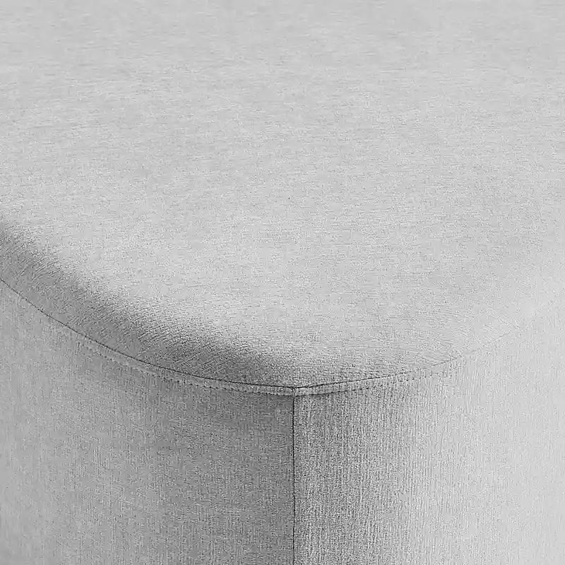 Pouf d'appoint triangulaire capitonné moderne