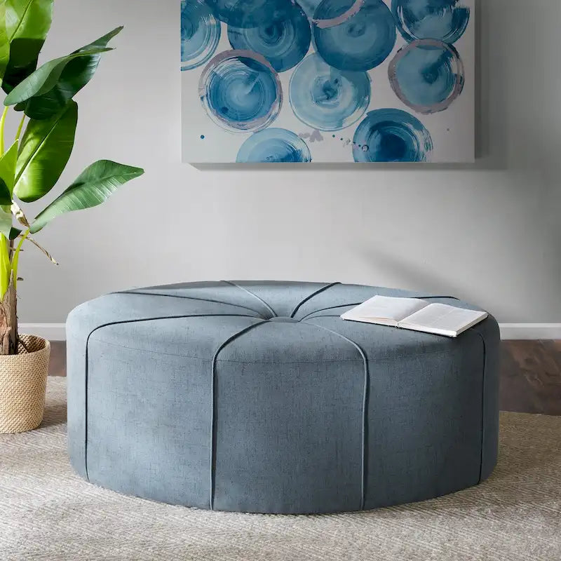 Pouf capitonné ovale surdimensionné