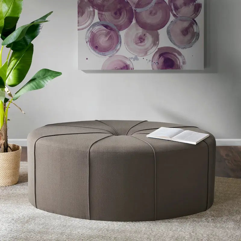 Pouf capitonné ovale surdimensionné