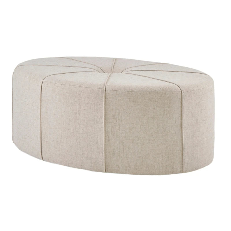 Pouf capitonné ovale surdimensionné